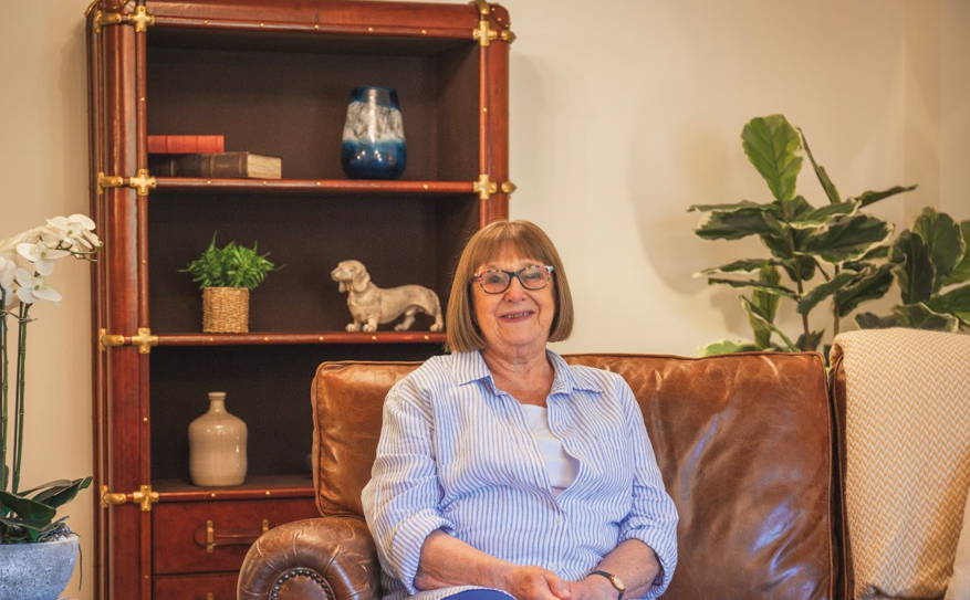 Homeowner Lesley sat in her Adlington Retirement Living apartment